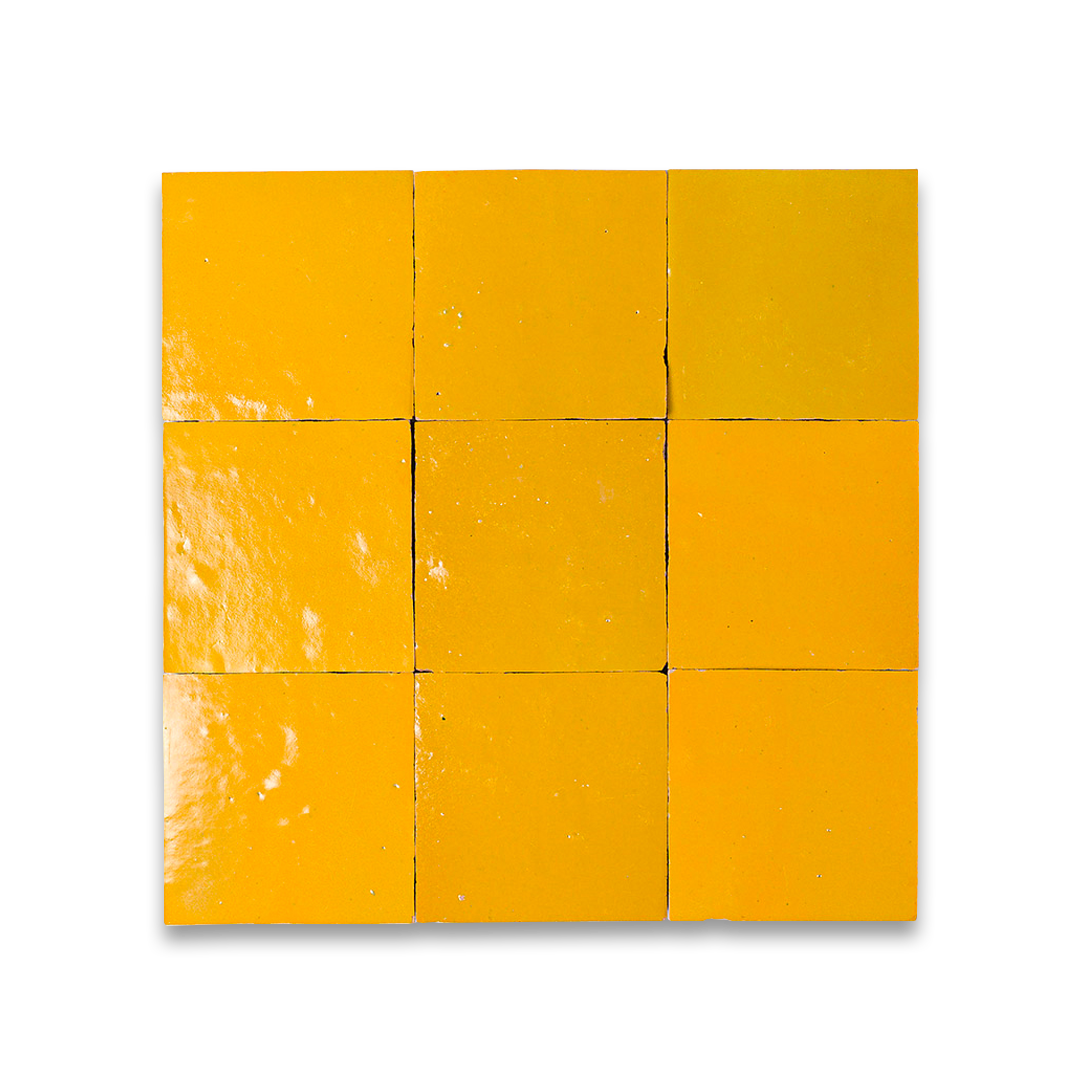 Nine yellow ceramic tiles arranged in a 3x3 grid on a white background