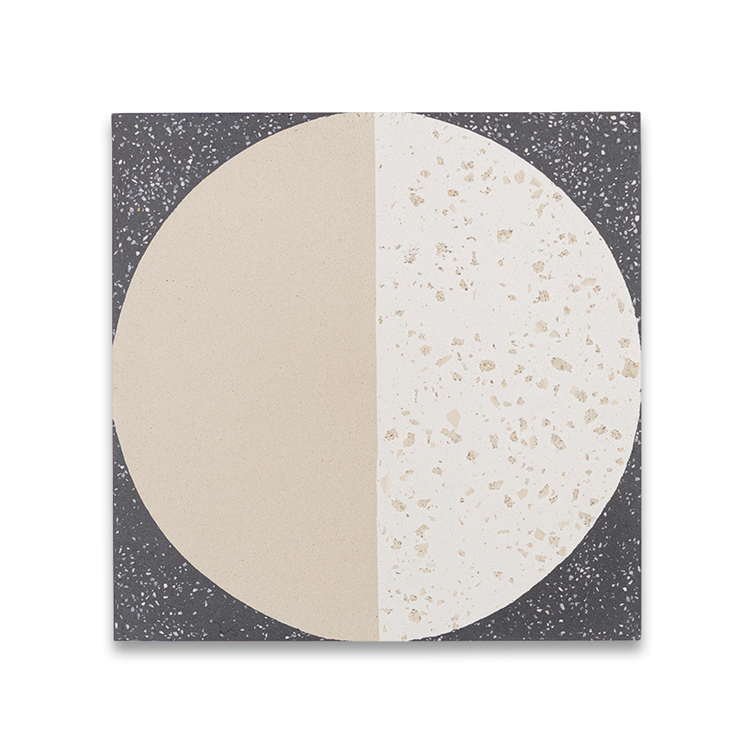 Square cement tile featuring a modern geometric design with a half-beige and half-white terrazzo circle on a dark speckled background, ideal for contemporary flooring and wall décor.