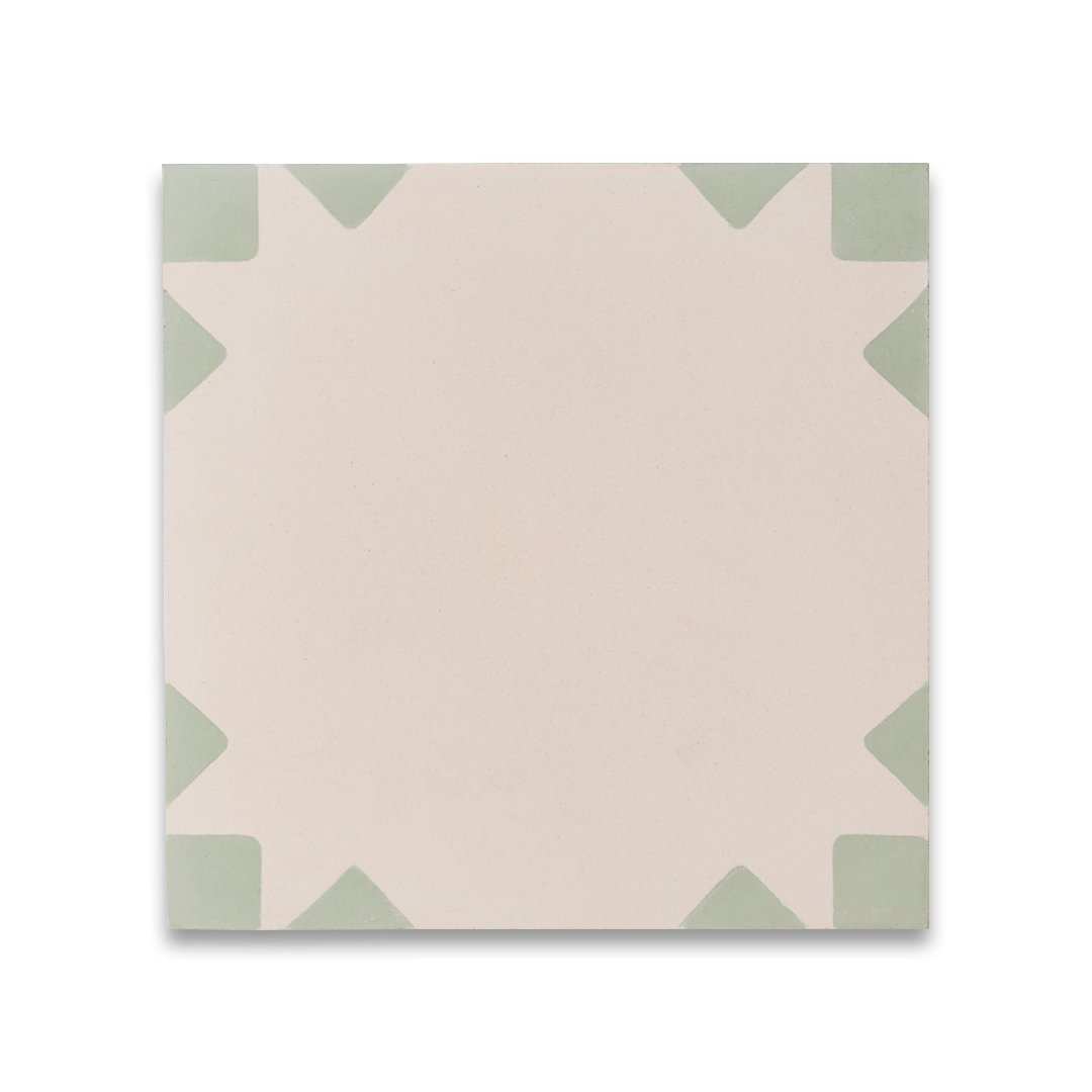 Sage Edge cement tile featuring a soft cream base with muted sage green corner accents, ideal for modern interiors, patterned flooring, and wall applications in contemporary spaces.