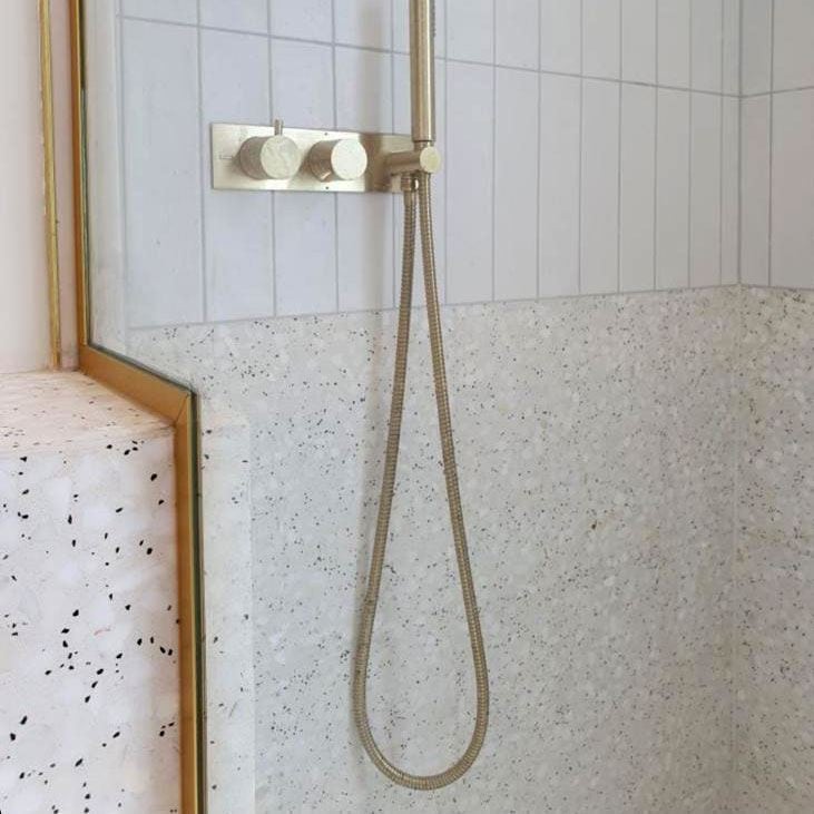 Decorative terrazzo tile showing multicolor aggregate