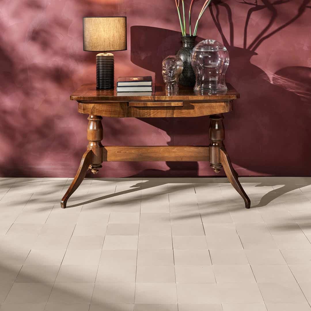 A solid beige color with a smooth matte finish, square shape, ideal for minimalist, modern, or contemporary flooring, backsplash, and wall décor applications.