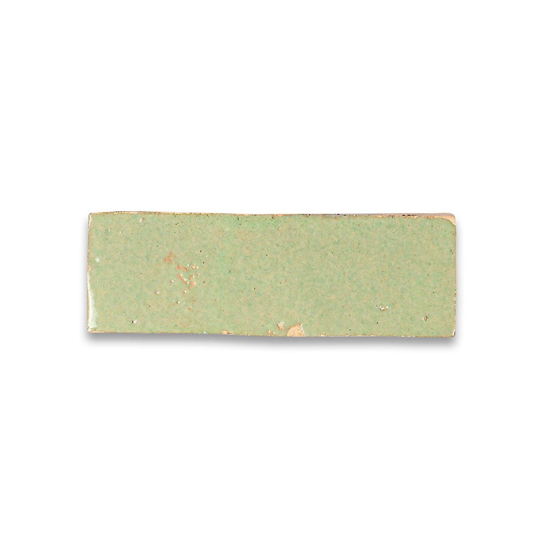 Rectangular green ceramic tile on a white background
