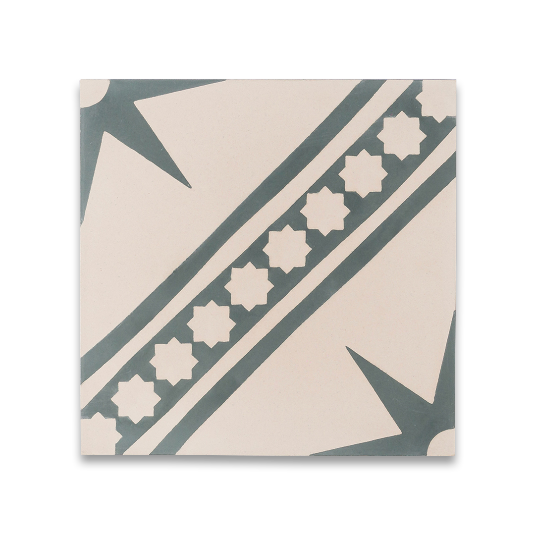 Starline Diagonal cement tile featuring a cream base with dark grey geometric star motifs and diagonal stripe accents, ideal for Mediterranean interiors, patterned flooring, and decorative wall applications.