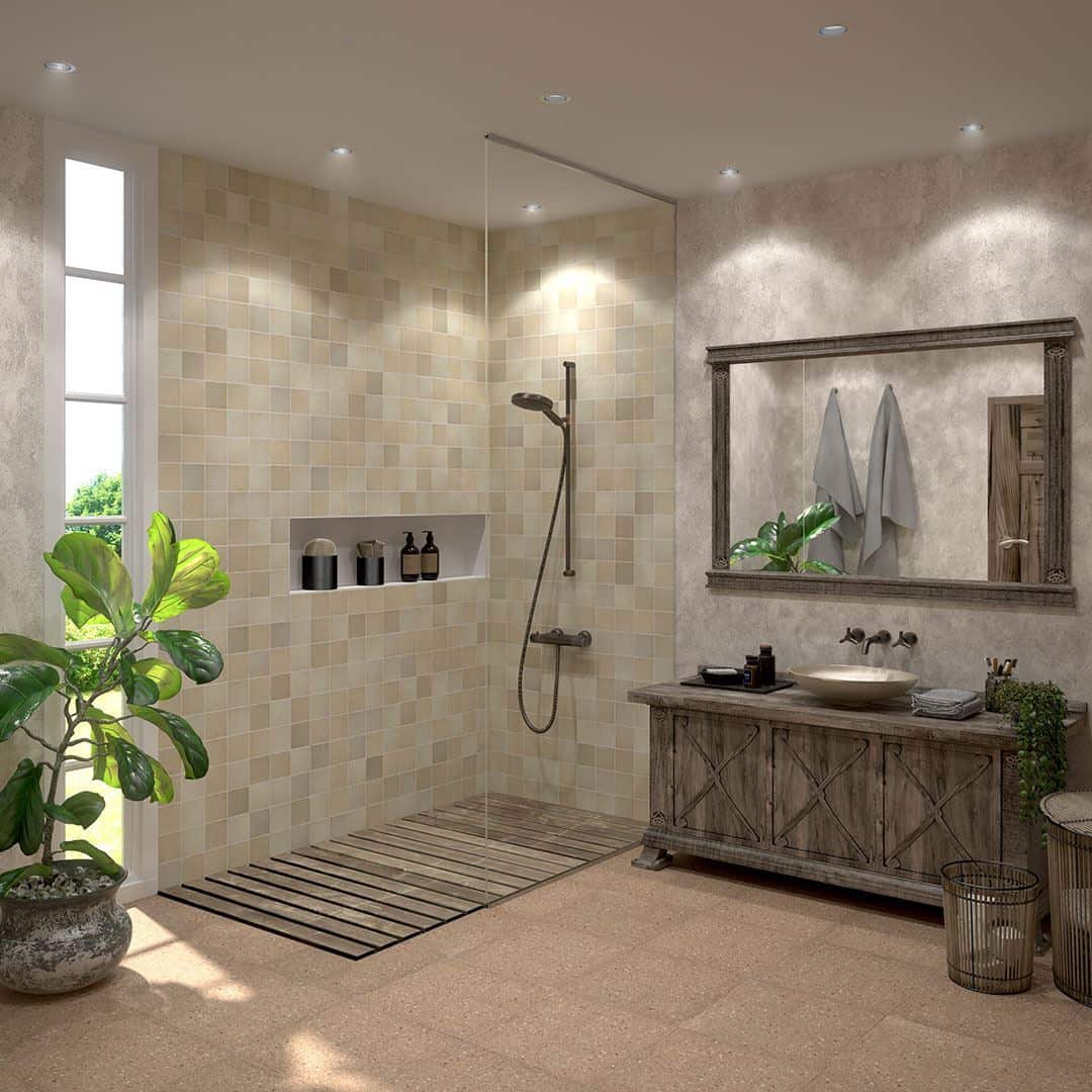 Spacious modern bathroom with walk-in shower, beige tile walls, wood vanity, large mirror, and terrazzo-style flooring.