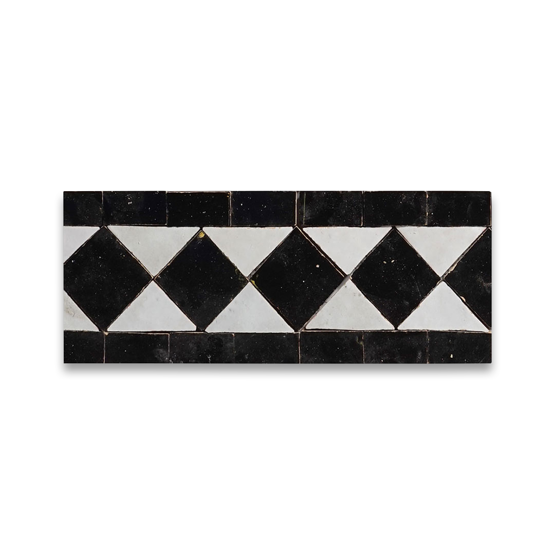 Decorative tile with black and white diamond pattern on a white background