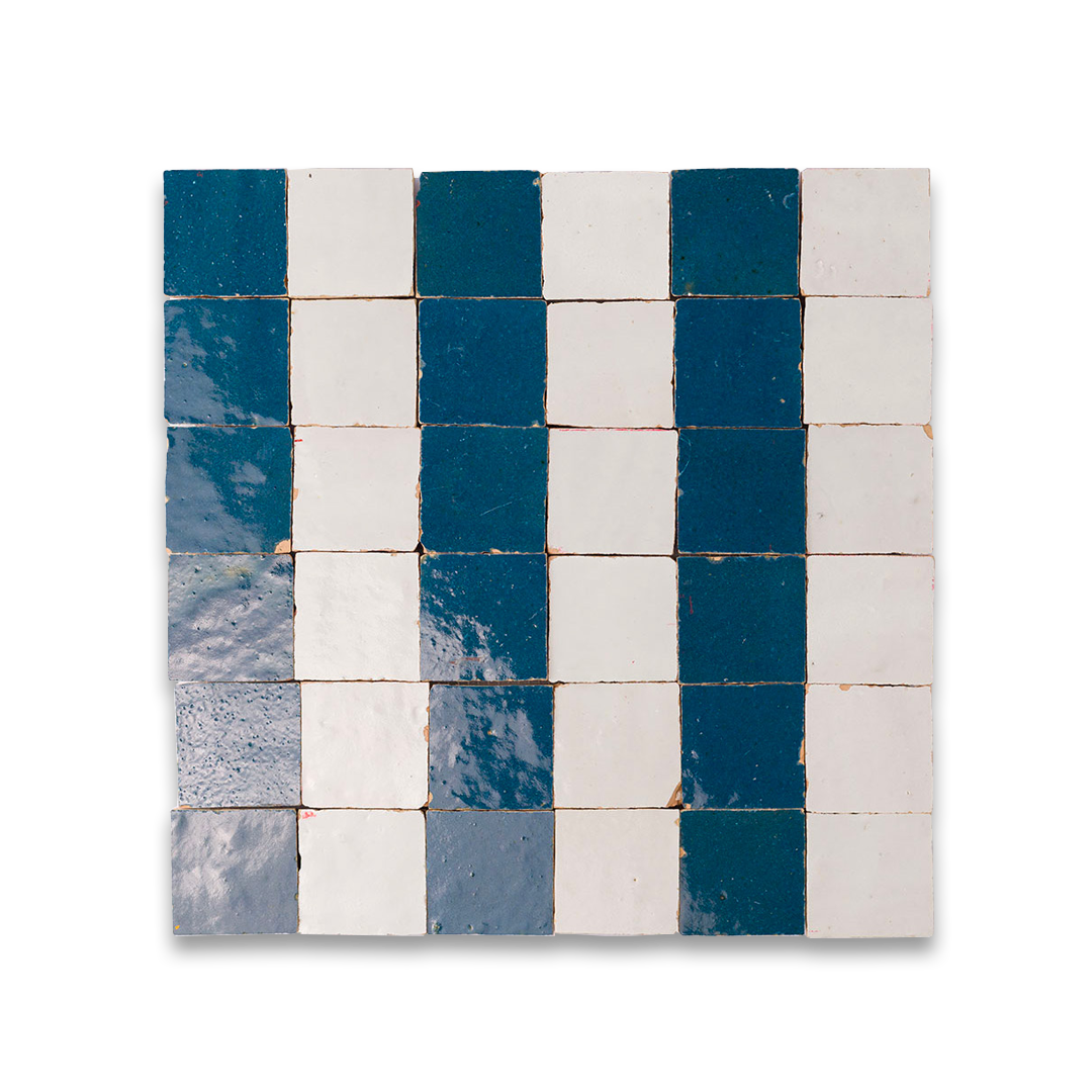 Square tile with blue and white striped pattern on a white background