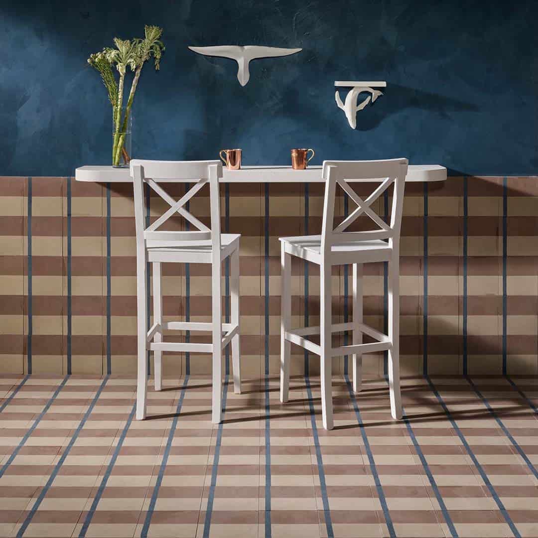 A geometric pattern with terracotta brown, beige, and a vertical blue stripe, ideal for modern flooring, wall accents, or minimalist interior decor.