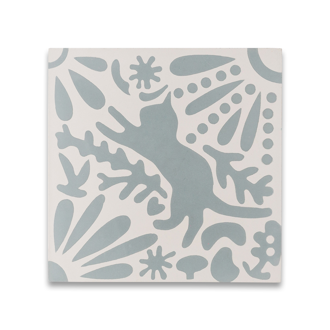 Decorative tile with abstract cat and plant design in blue on a beige background
