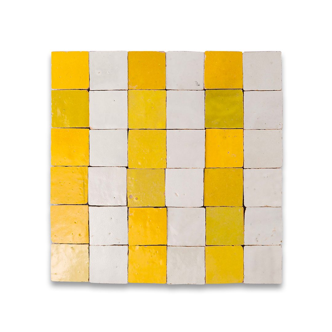 Checkerboard pattern of small square tiles in yellow and off-white with a slightly textured, handmade finish.