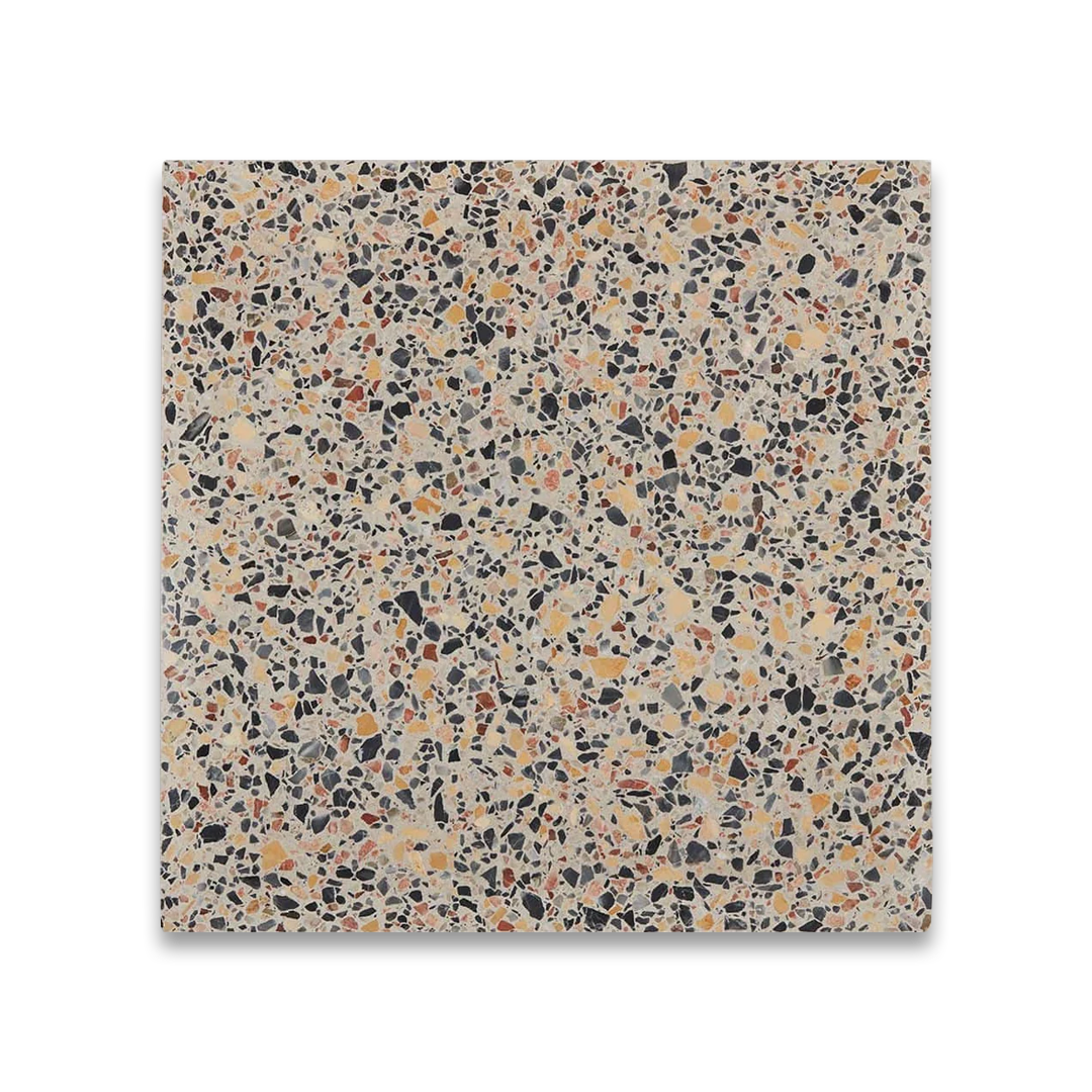 Neutral terrazzo tile surface with multicolored stone chips in beige, black, gray, and warm earthy tones.