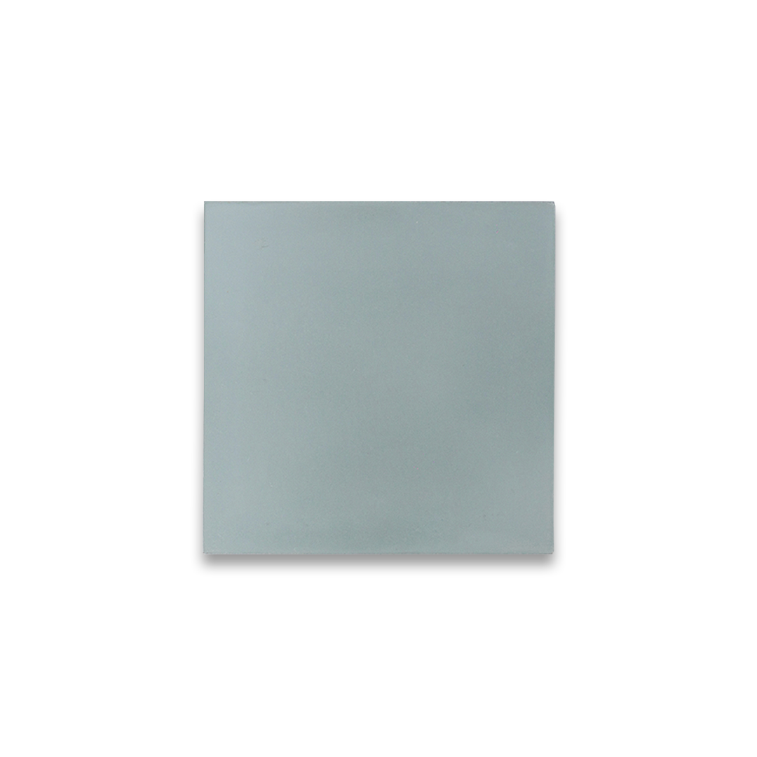 Square plain light grey cement tile with a smooth matte finish, ideal for minimalist flooring, wall cladding, kitchen backsplash, and modern industrial interior design applications.
