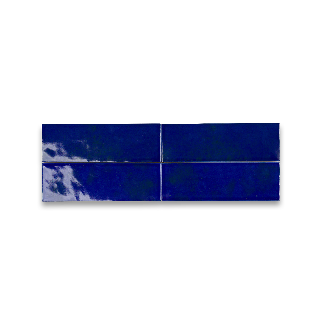 Four blue tiles arranged in a horizontal line on a white background