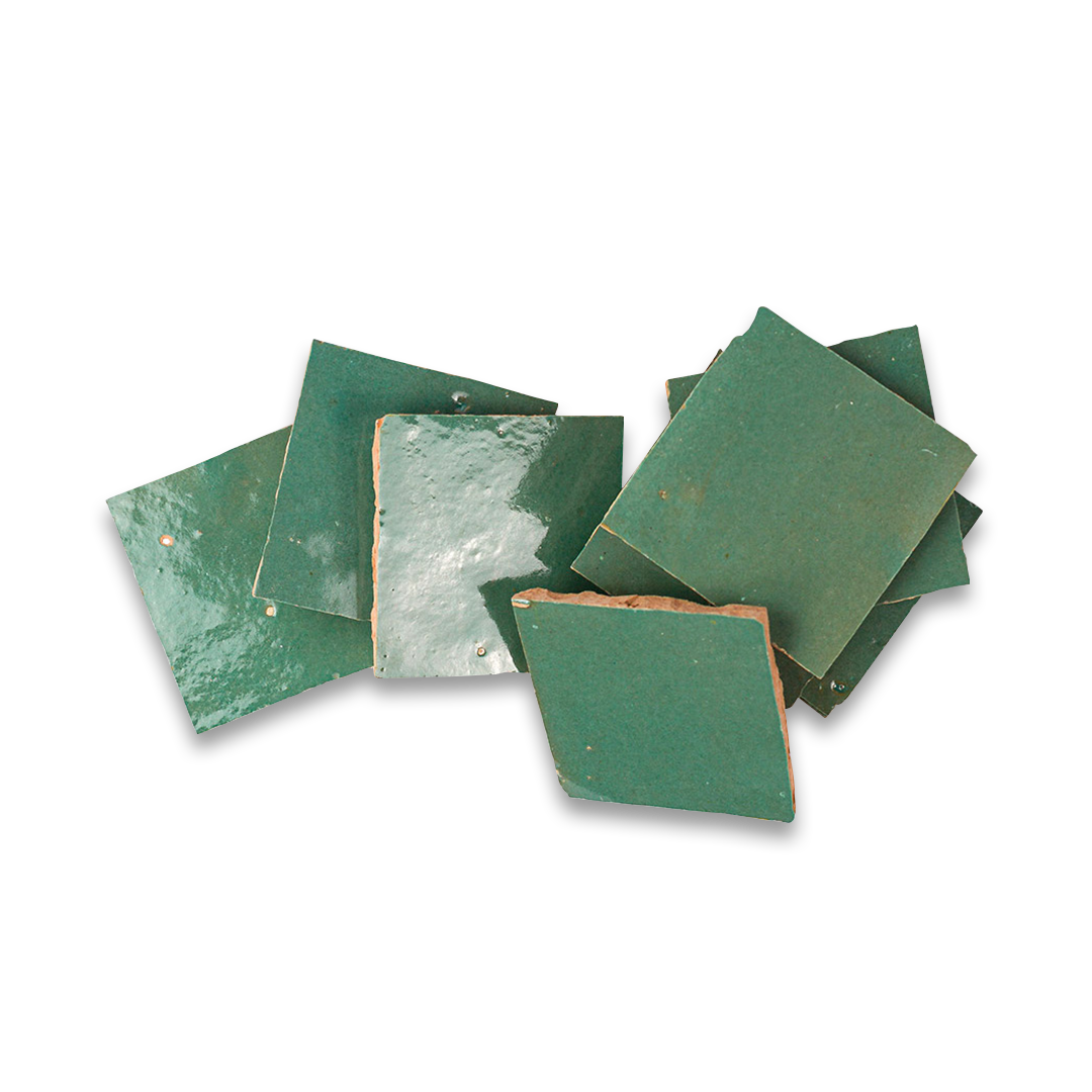 Set of green square tiles on a white background