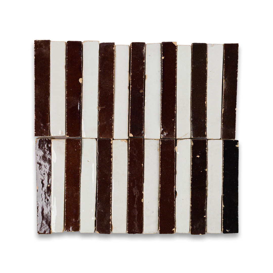 A brown and white striped tile featuring alternating colors in a geometric pattern.