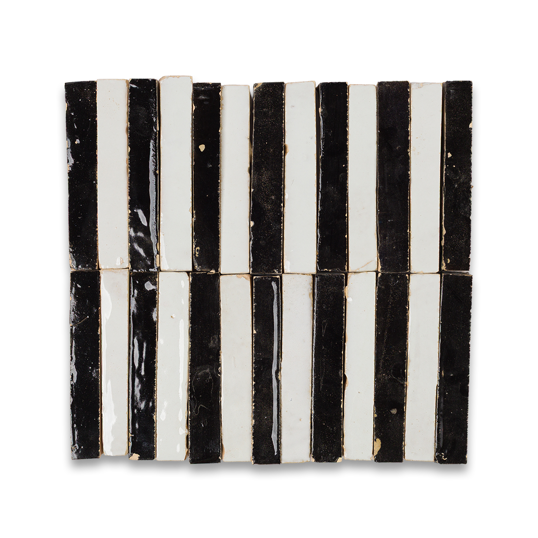 A black and white striped tile featuring alternating colors in a geometric pattern.