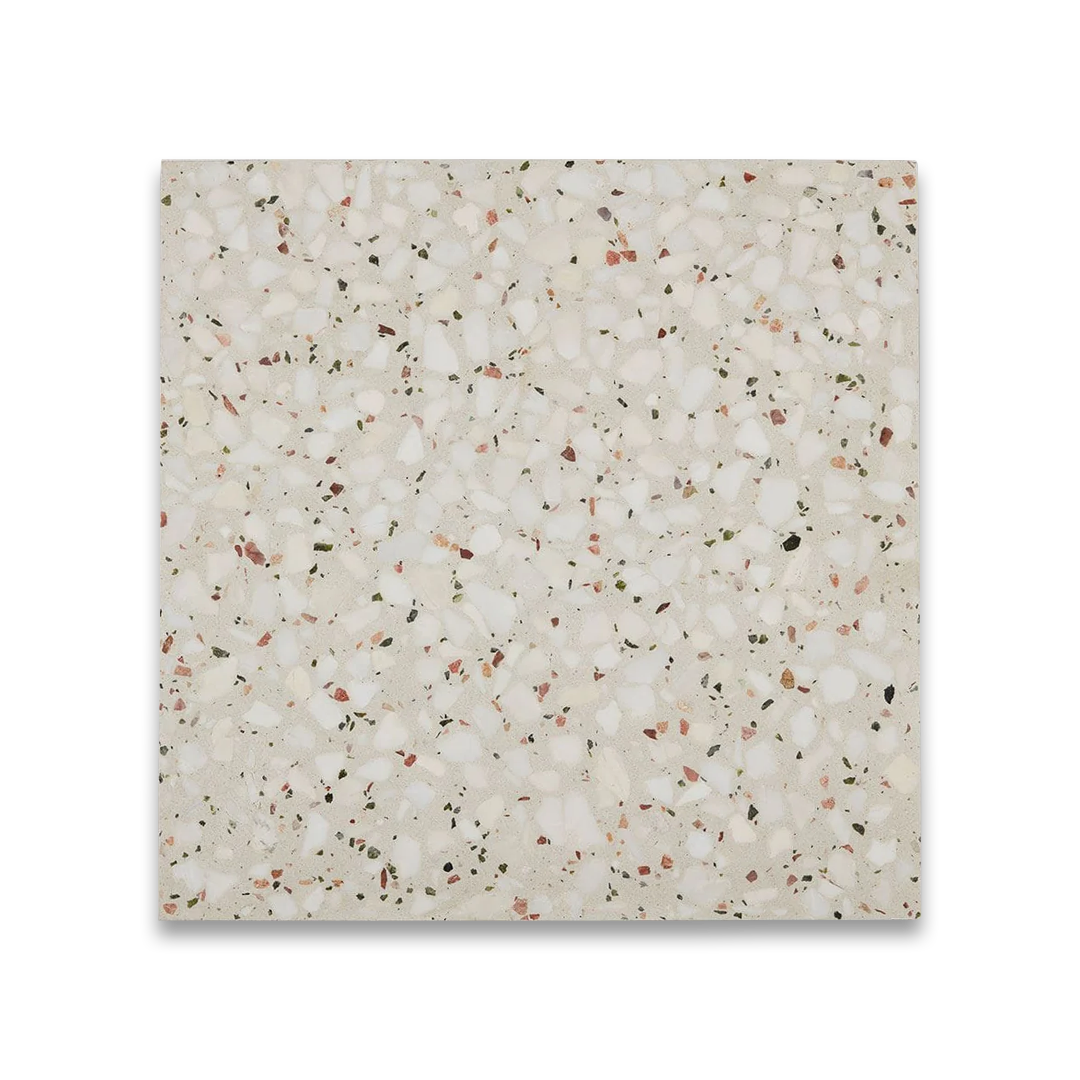 Square tile with a speckled pattern on a white background