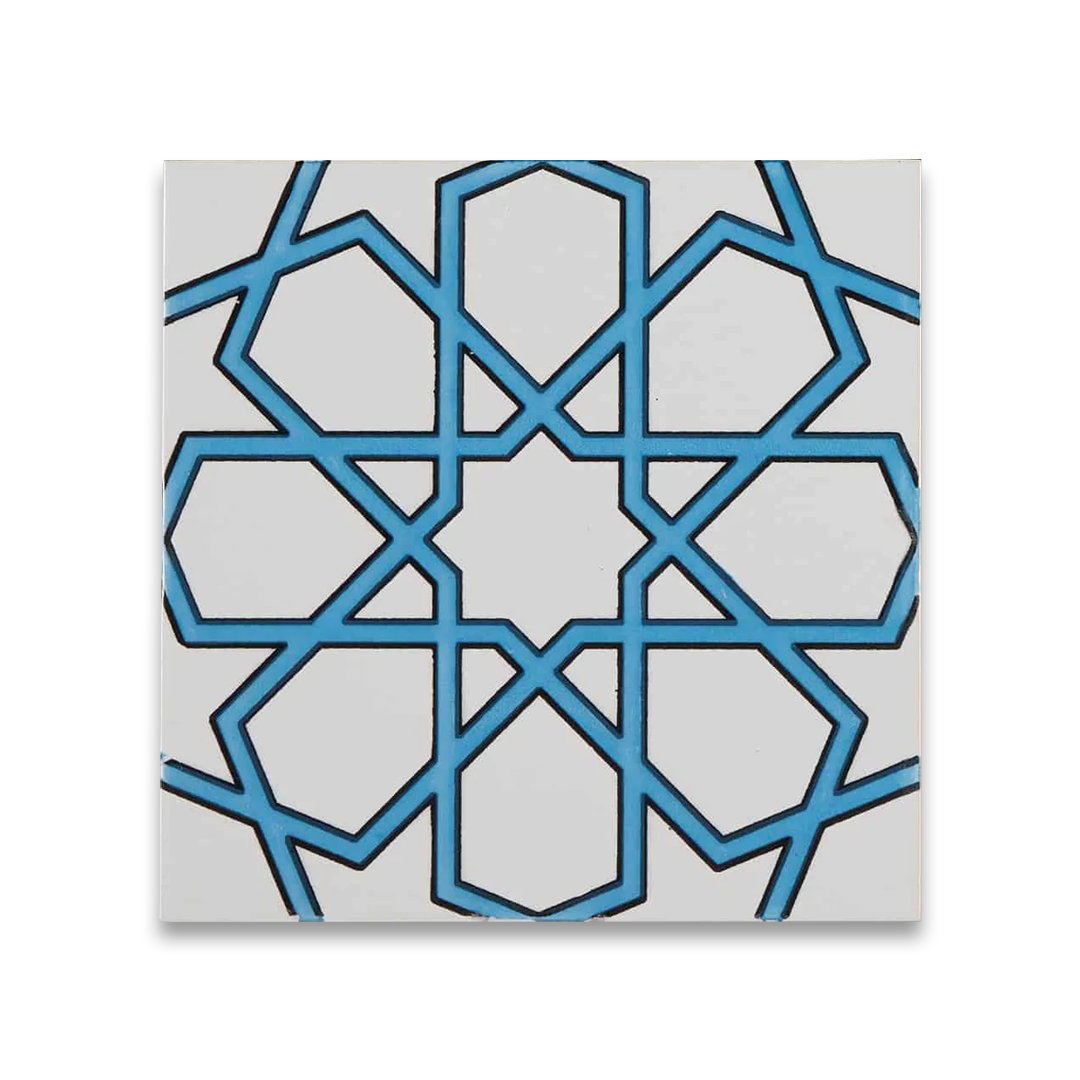 Blue geometric tile pattern with star motif on white background, inspired by Moroccan design.