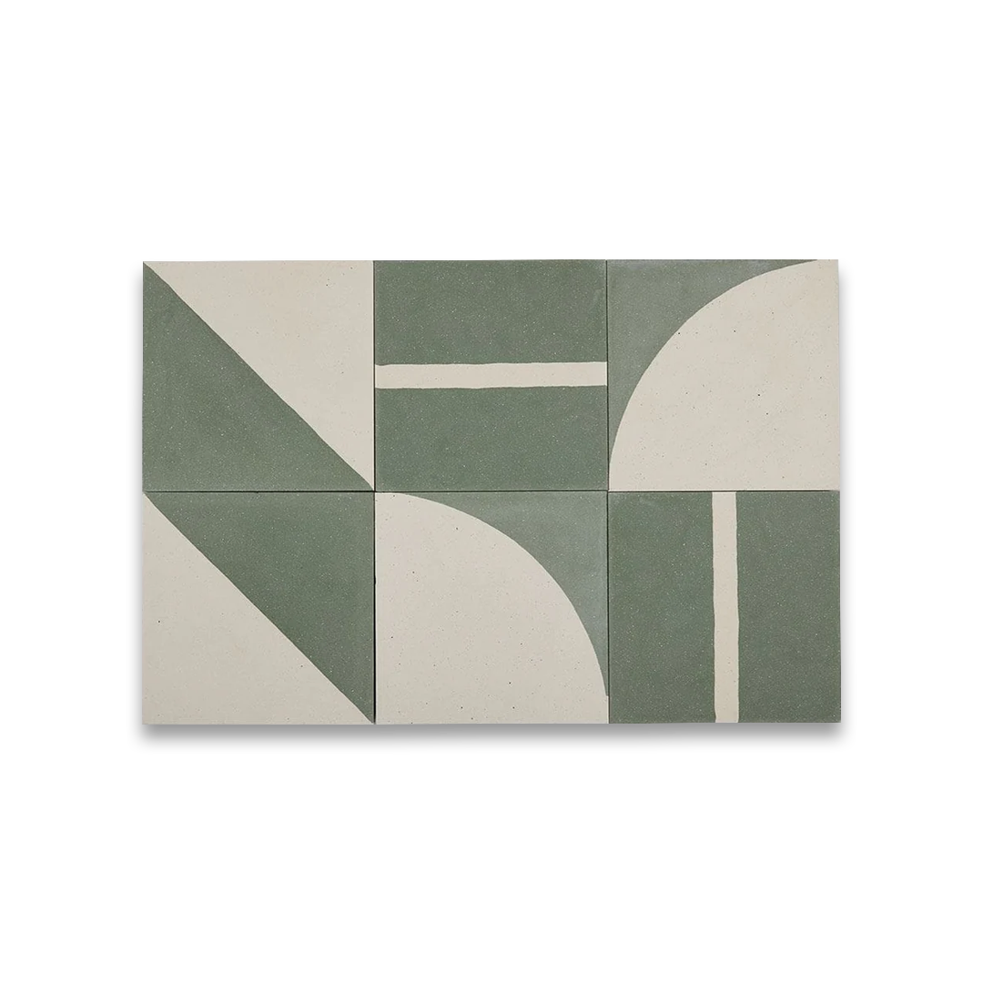 Square ceramic tiles in muted green and off-white, with varied geometric shapes, forming a cohesive modern decorative interior pattern.