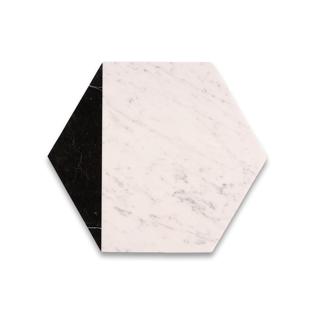 Hexagonal marble coaster with black and white pattern on a white background