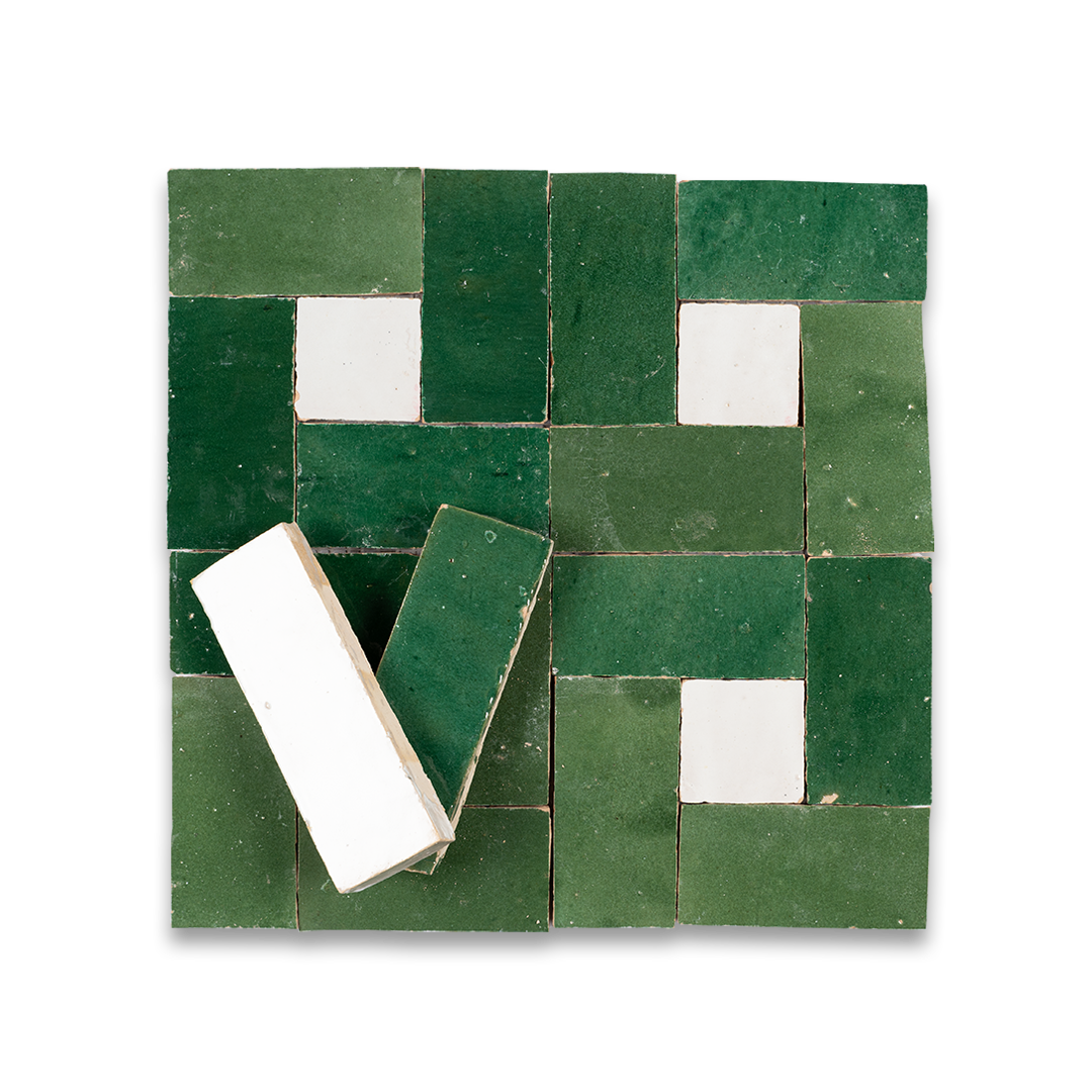 Green and white square tiles on a white background