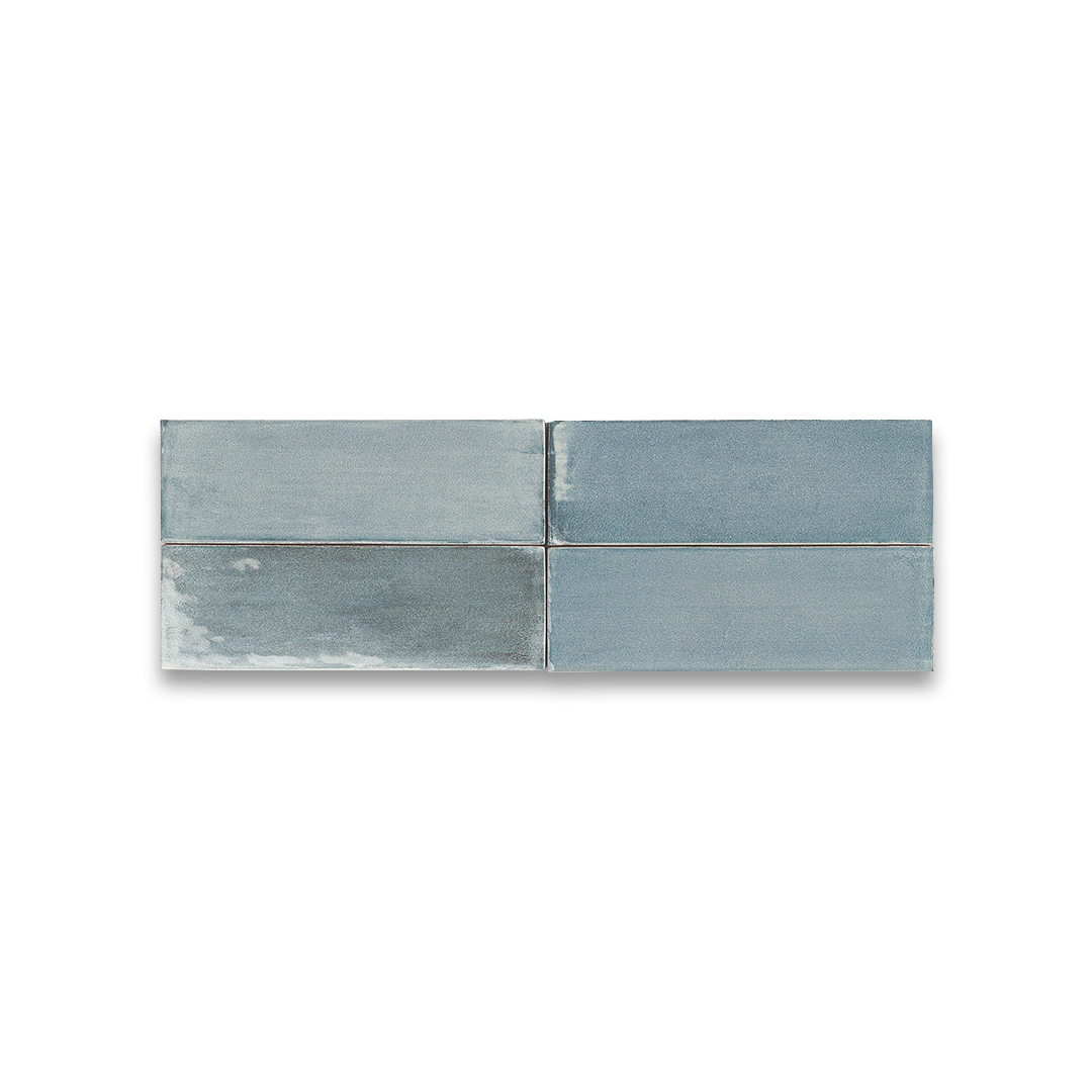 Two blue ceramic tiles on a white background