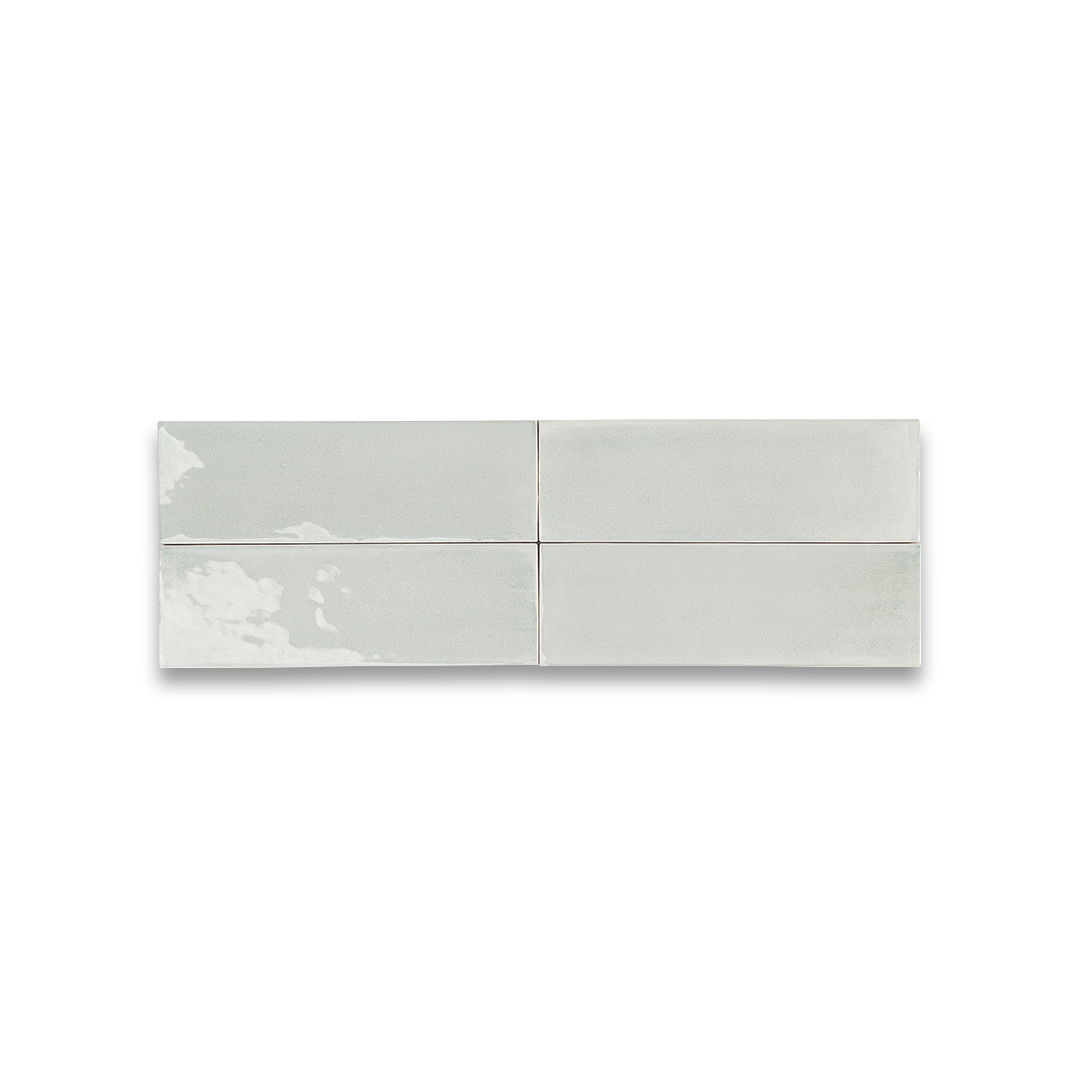 Two white rectangular tiles with a subtle pattern on a white background