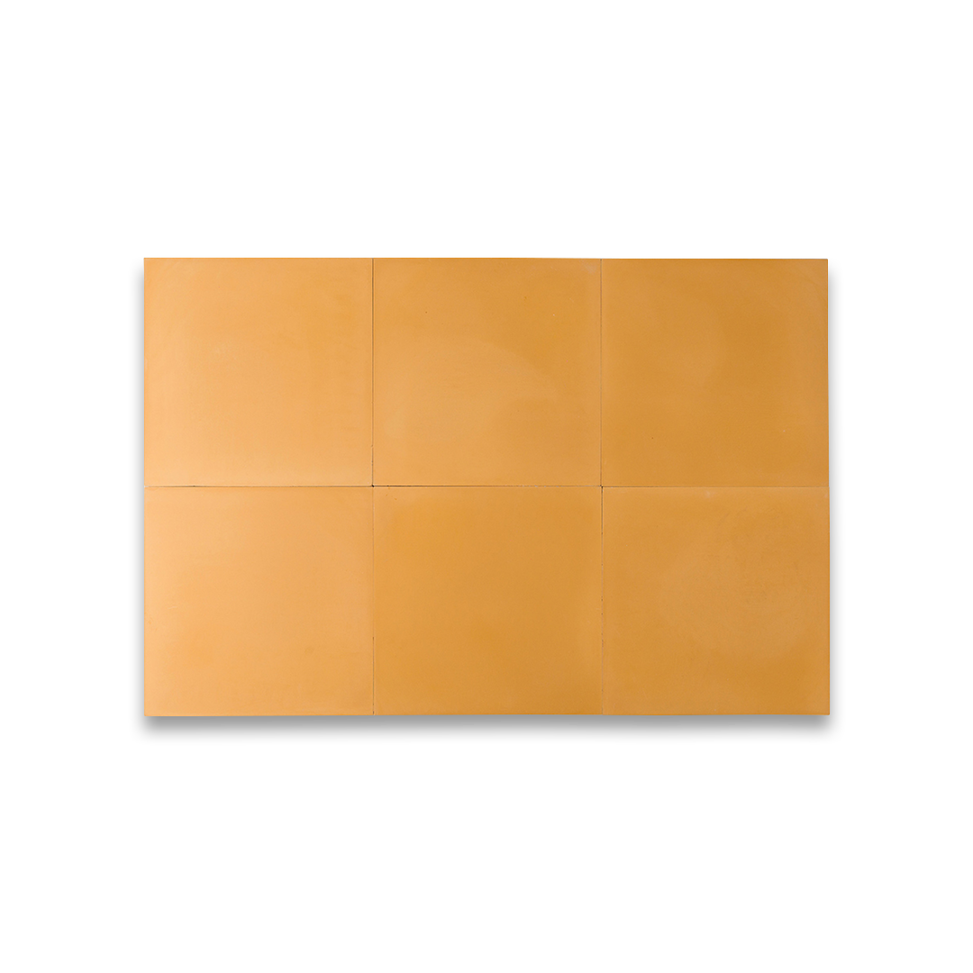 Square cement tile design in solid ochre yellow color with a smooth matte finish, ideal for modern flooring, wall cladding, kitchen backsplashes, or Mediterranean-style interiors.