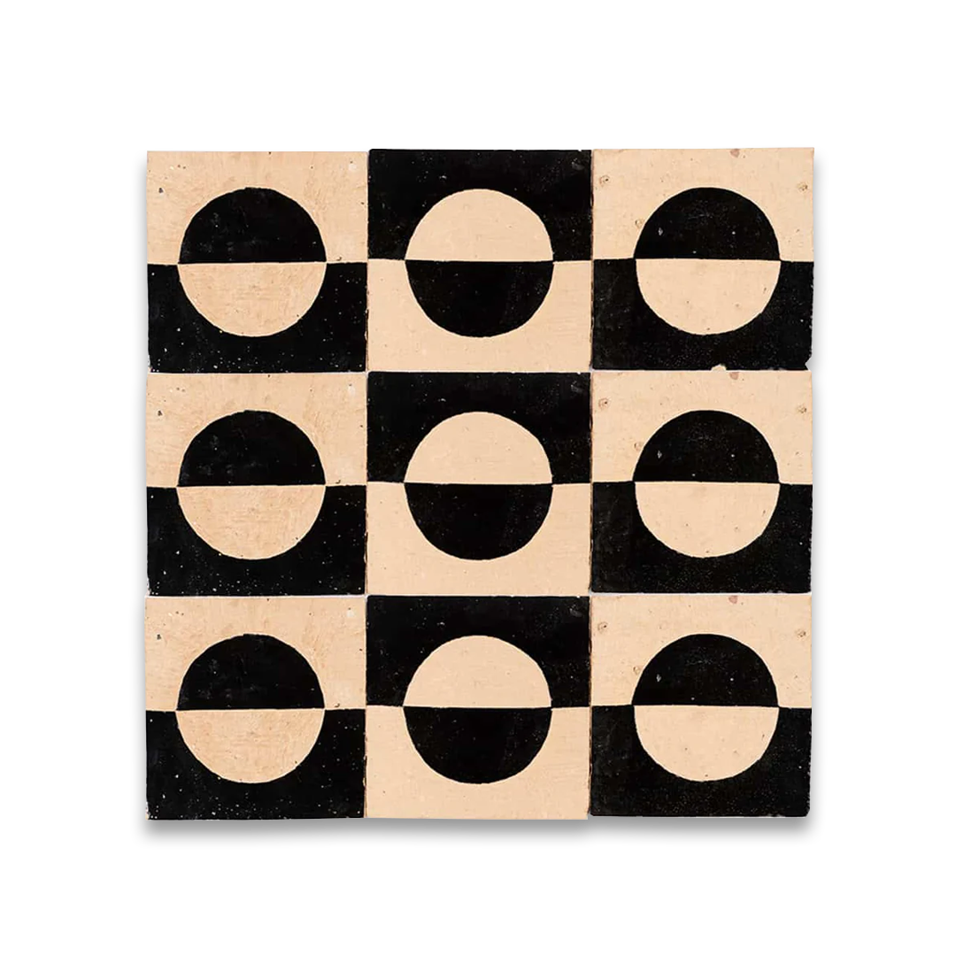 Square tile with black and beige circular patterns on a white background