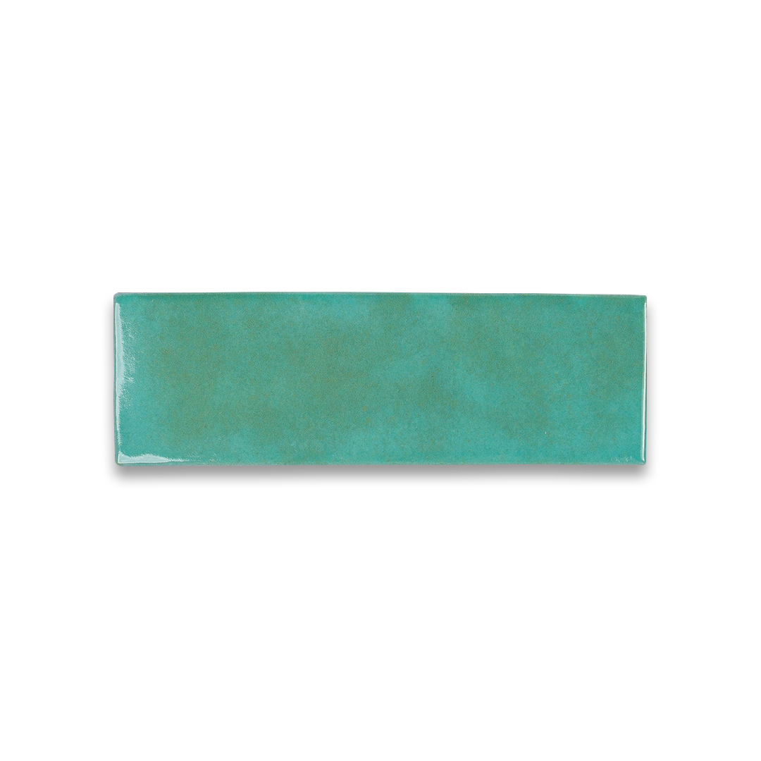 Teal rectangular ceramic tile on a white background
