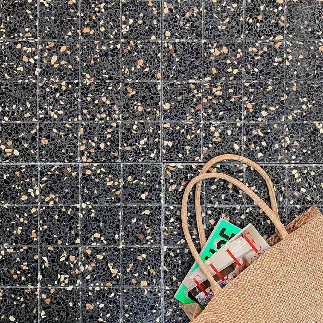Terrazzo tiles with a speckled pattern