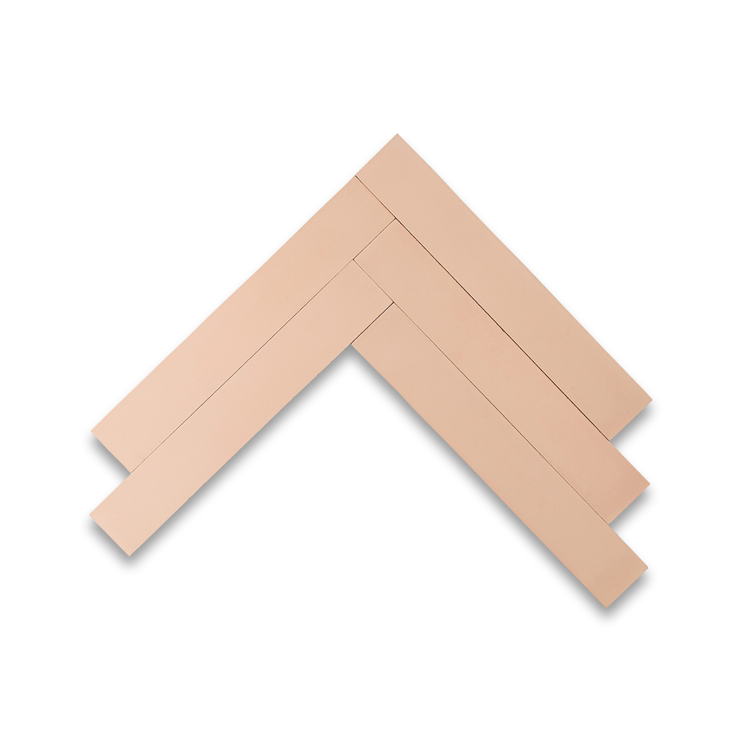 A rectangular blush pink tiles arranged in a herringbone pattern, matte finish, ideal for modern, Scandinavian, or minimalist flooring and wall décor applications.