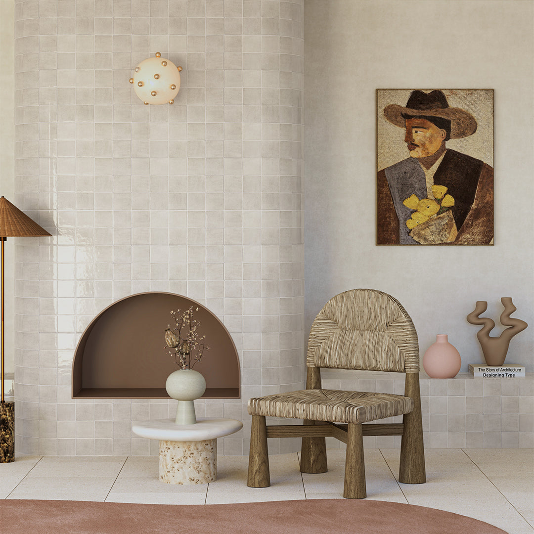 Modern interior with a textured wall, wooden chair, and decorative items.
