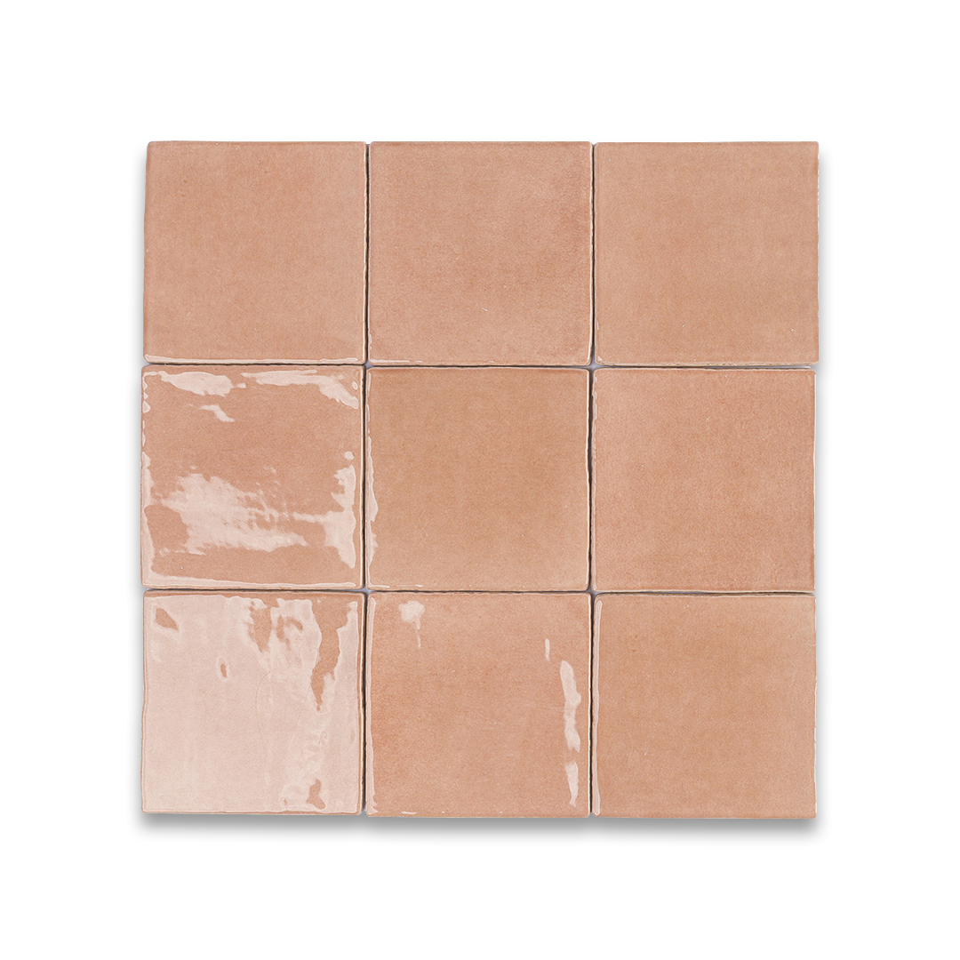 Nine square tiles with a terracotta color on a white background