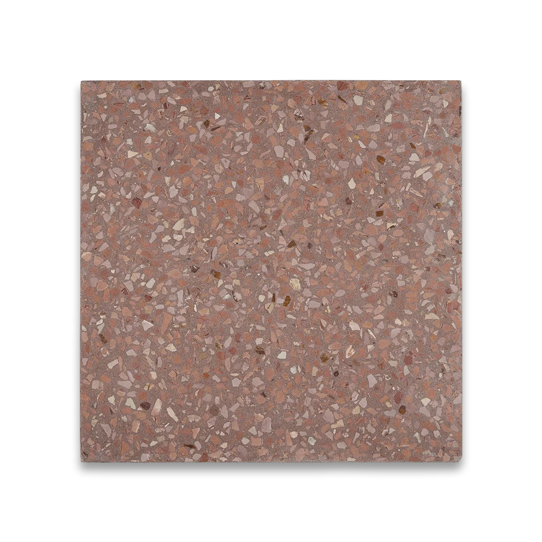 Terrazzo tile with a speckled pattern on a white background