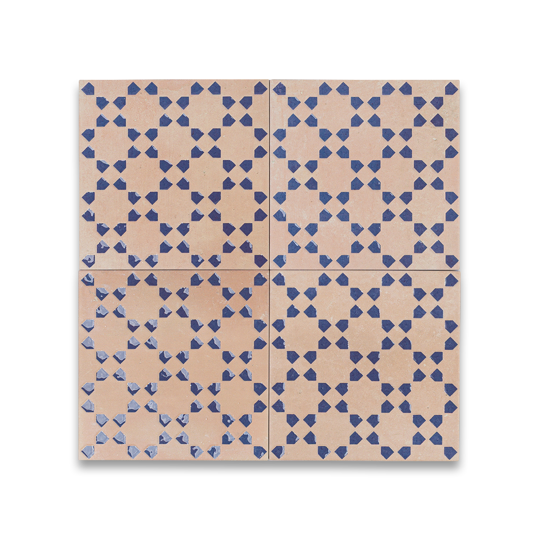 Four square tiles with a geometric blue and beige pattern on a white background