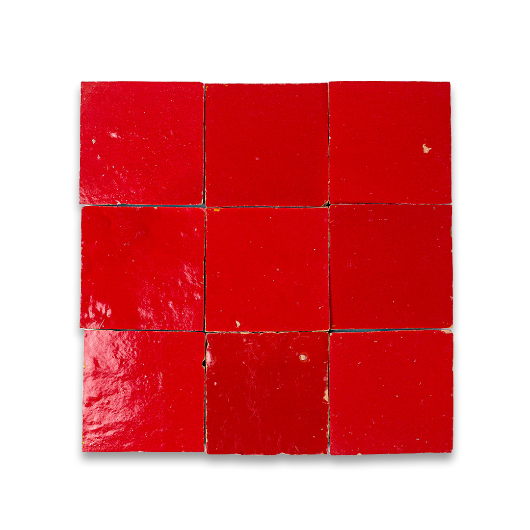 Nine red square tiles arranged in a 3x3 grid on a white background