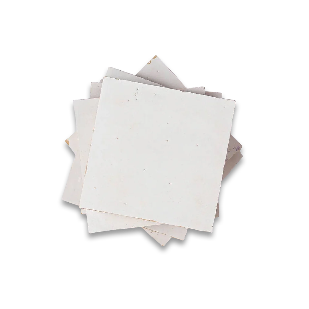 Stack of white square tiles on a white background