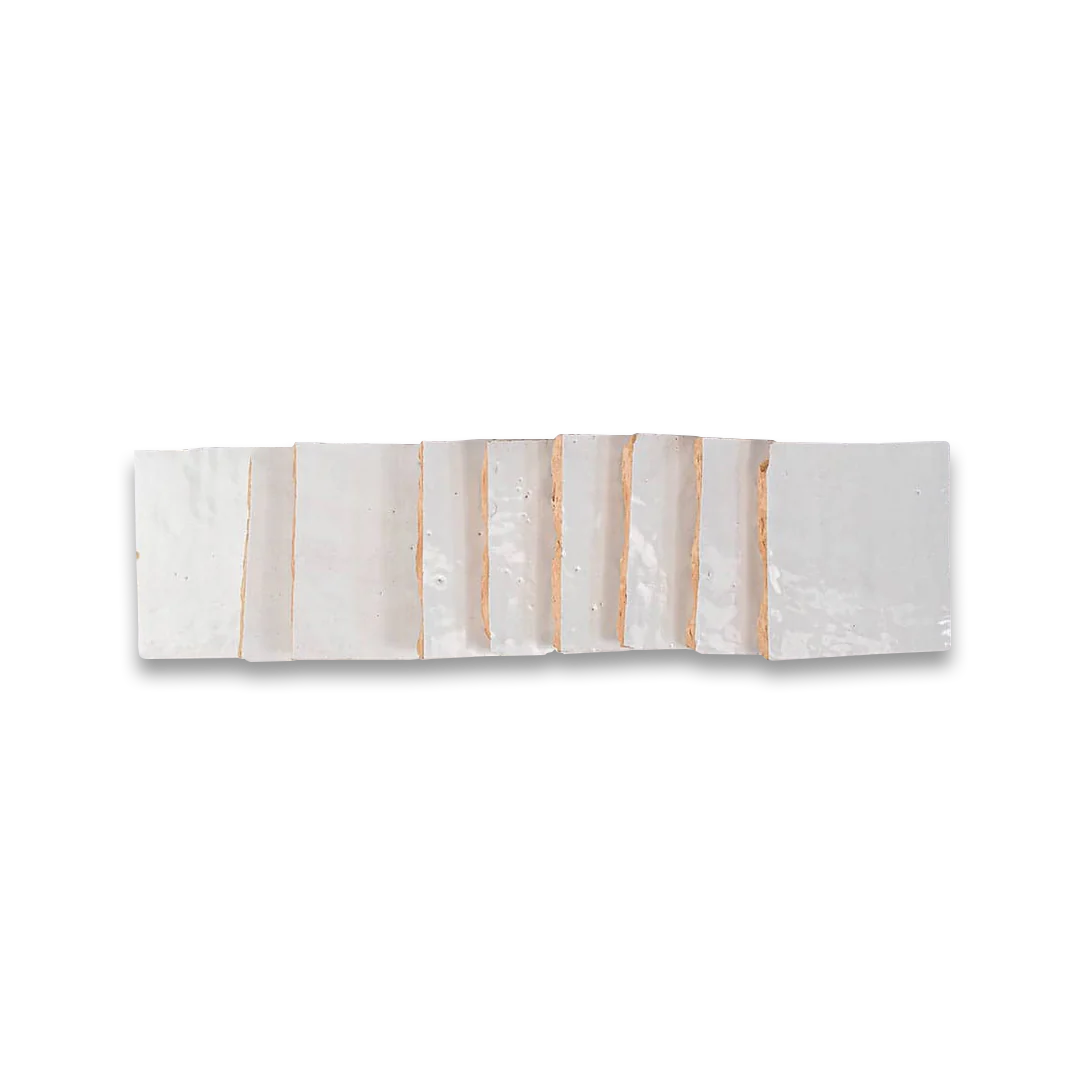 Rectangular marble slab with gold stripes on a white background