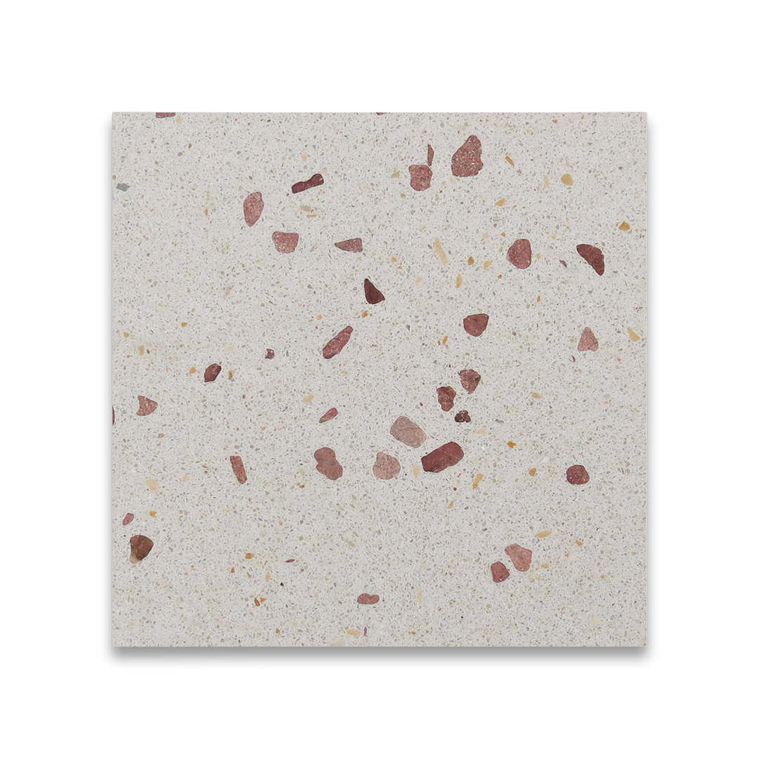 Terrazzo-style square tile with speckled pattern on a white background
