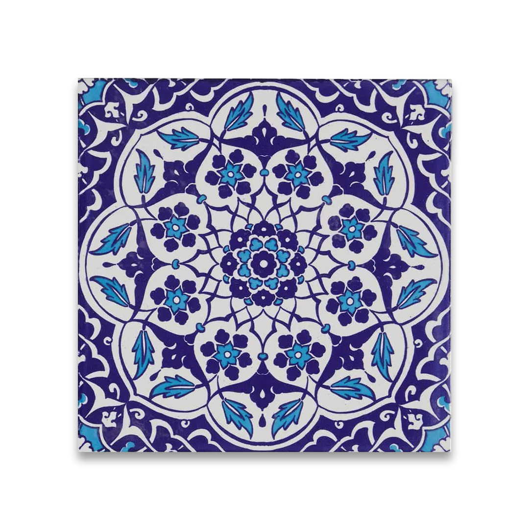 Decorative tile with blue and white floral pattern on a white background