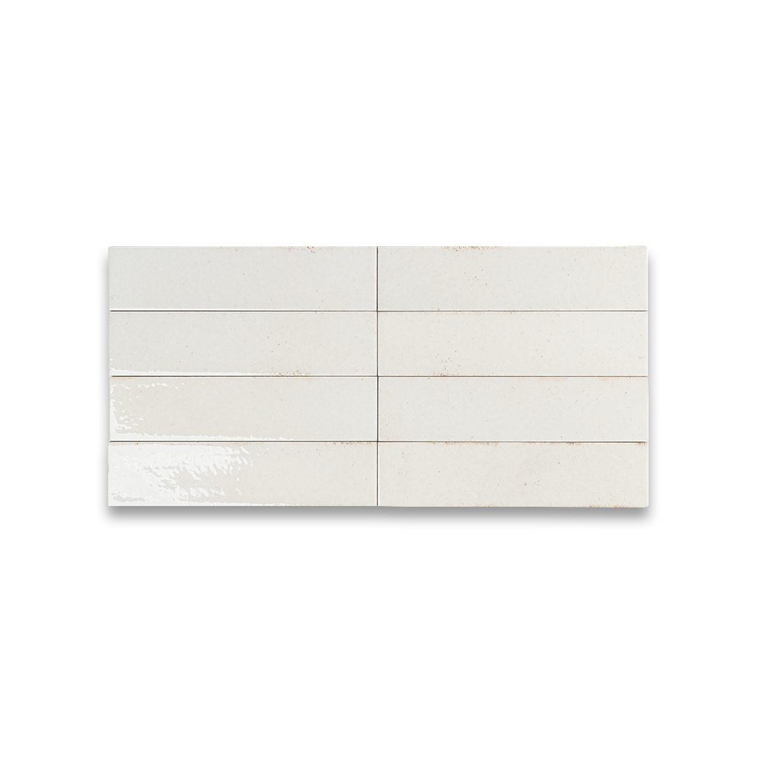 White rectangular tiles with a subtle pattern on a white background