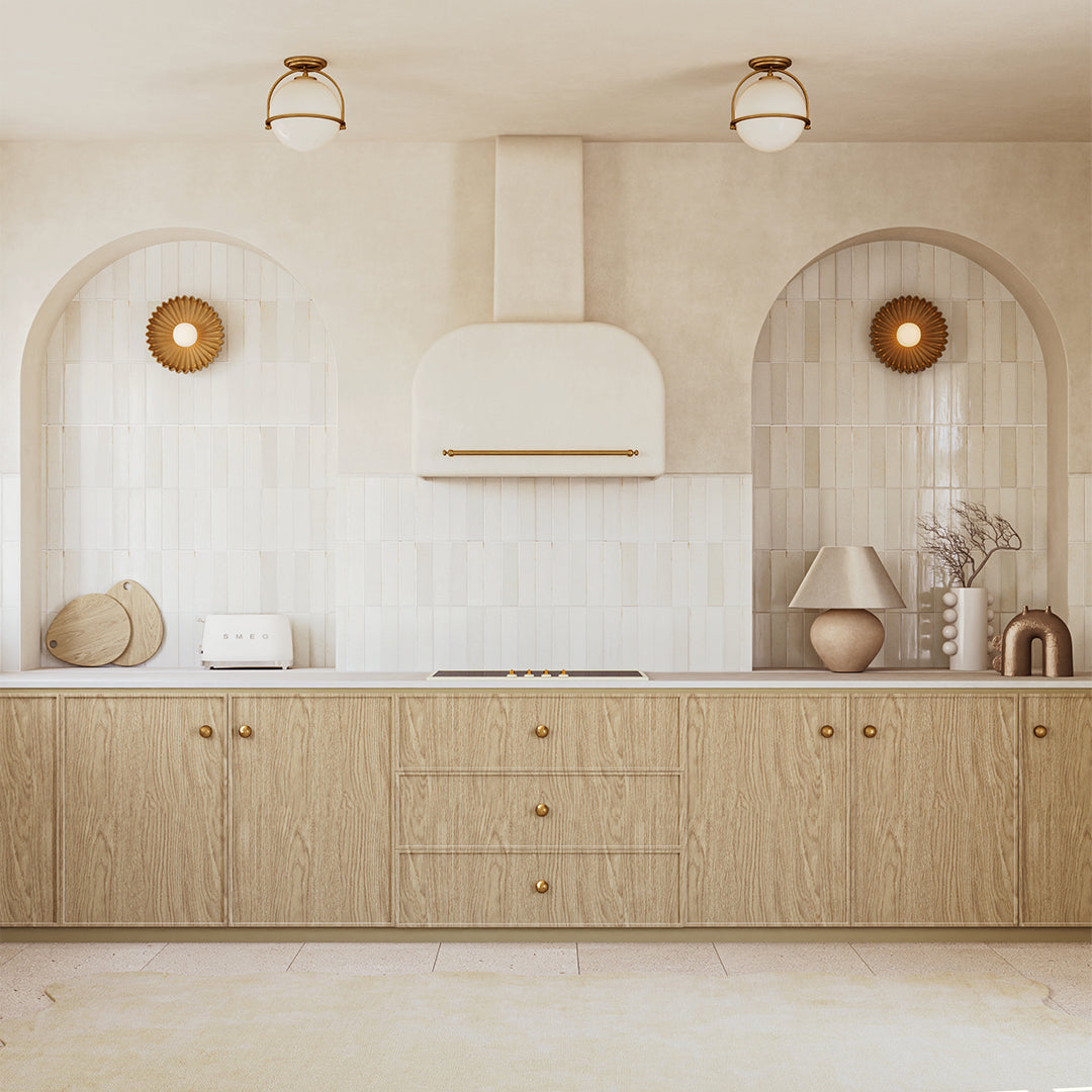 Modern kitchen with wooden cabinets, white appliances, and decorative elements.