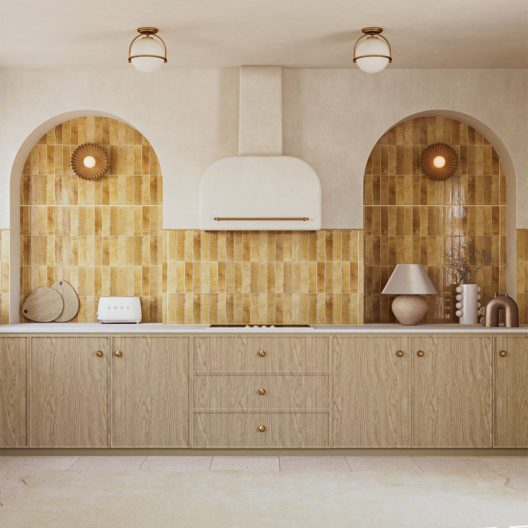 Modern kitchen with wooden cabinets, yellow tiled backsplash, and decorative elements.
