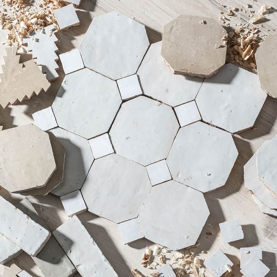 Hexagonal marble mosaic tiles on a white background