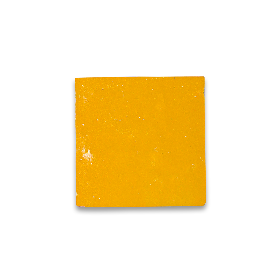Square piece of yellow fabric on a white background