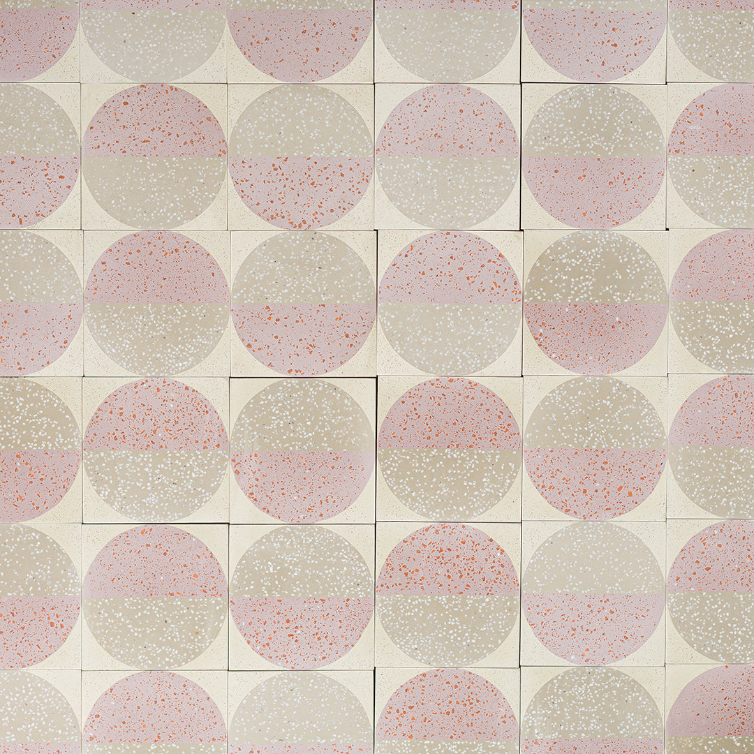 Square cement tile design featuring a terrazzo-style circular pattern in blush pink and beige tones with speckled texture, ideal for modern flooring, wall cladding, or contemporary interior decor.