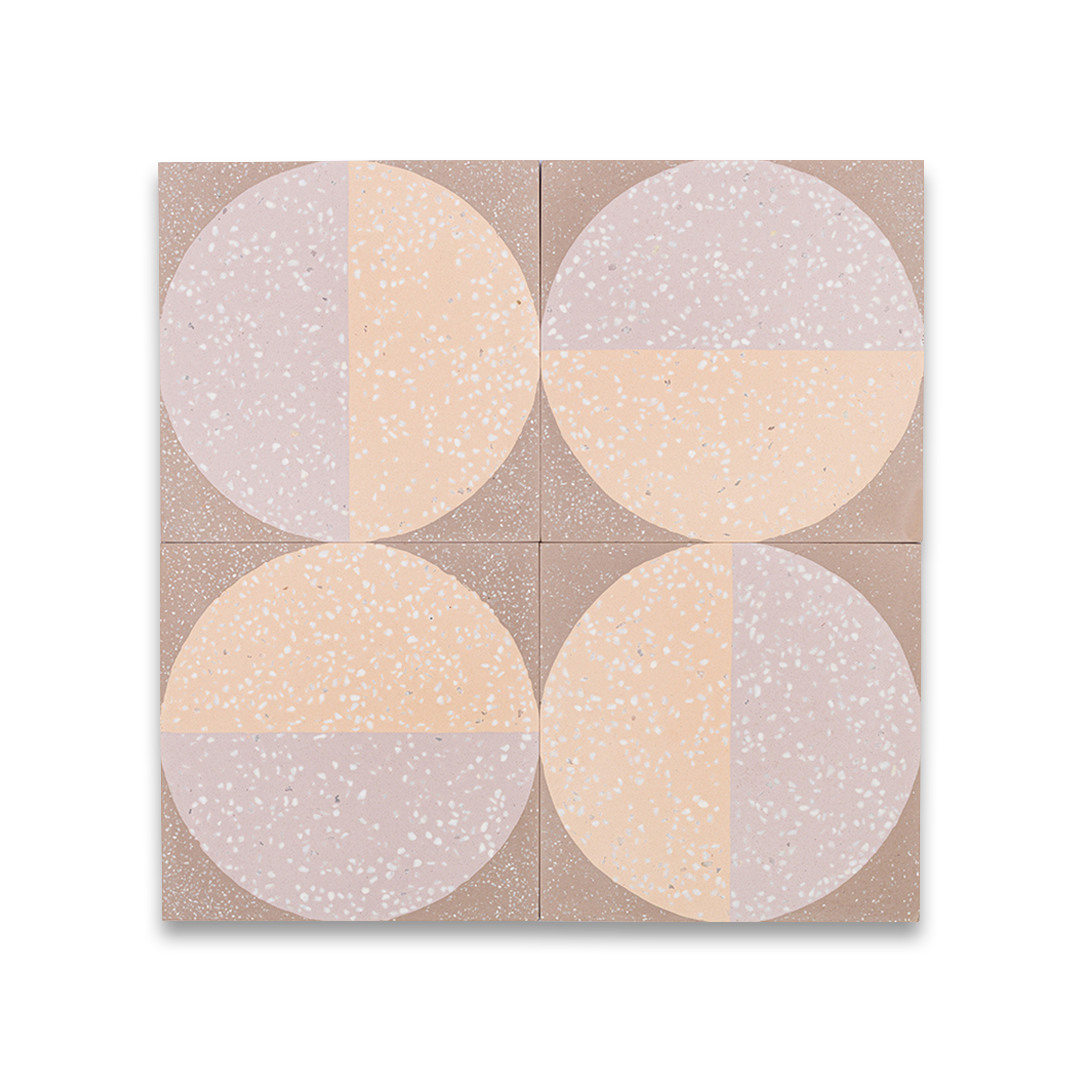 A large circular pattern in peach and lavender tones with speckled texture, ideal for contemporary flooring or wall decor.