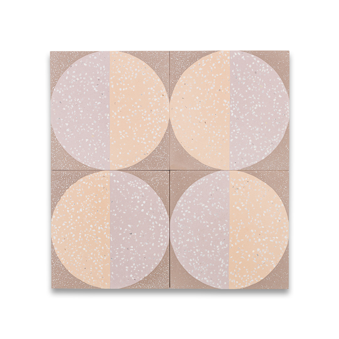 A large circular pattern in peach and lavender tones with speckled texture, ideal for contemporary flooring or wall decor.