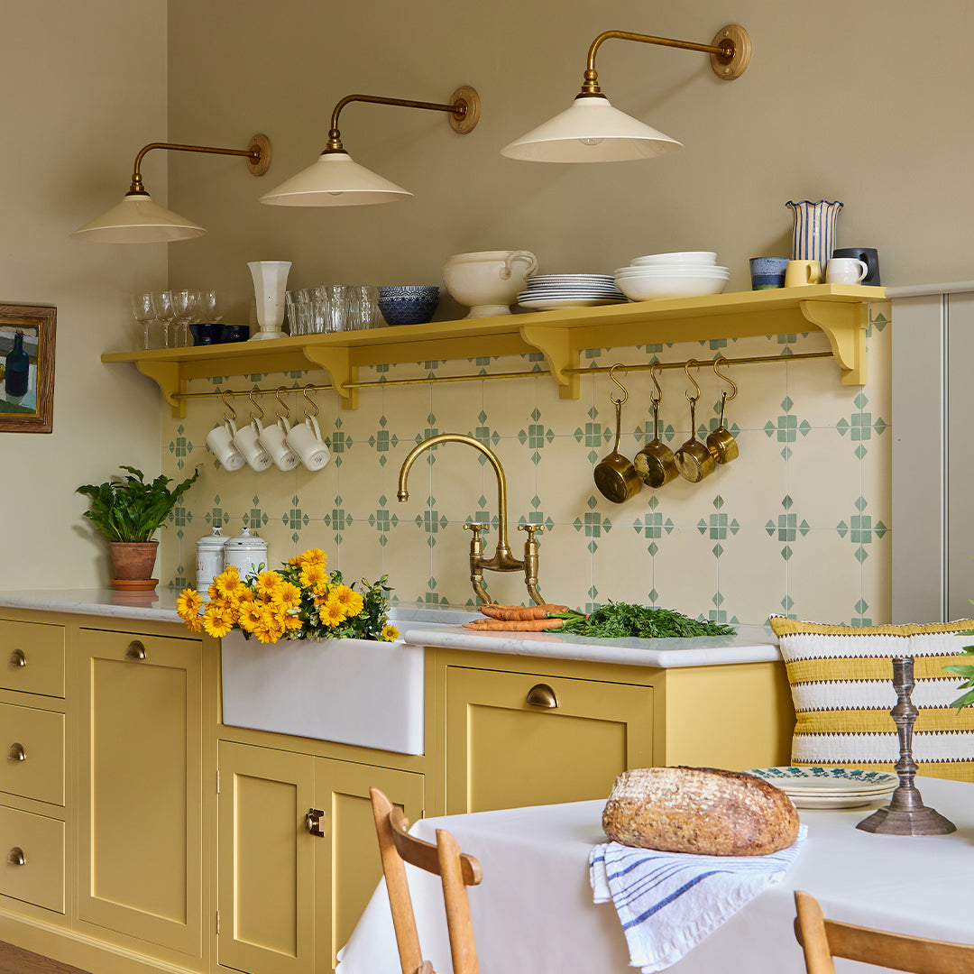 Sage Edge cement tile featuring a soft cream base with muted sage green corner accents, ideal for modern interiors, patterned flooring, and wall applications in contemporary spaces.