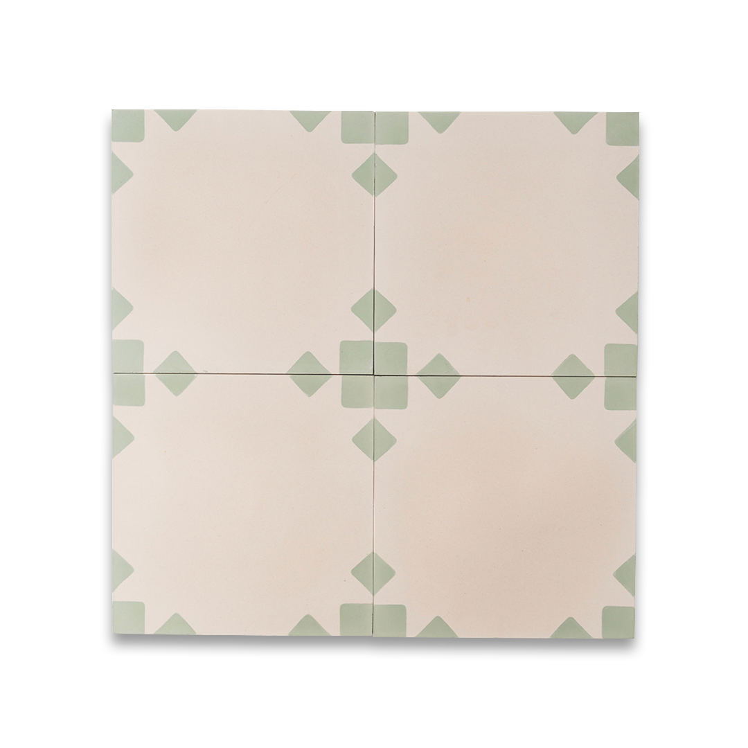 Sage Edge cement tile featuring a soft cream base with muted sage green corner accents, ideal for modern interiors, patterned flooring, and wall applications in contemporary spaces.